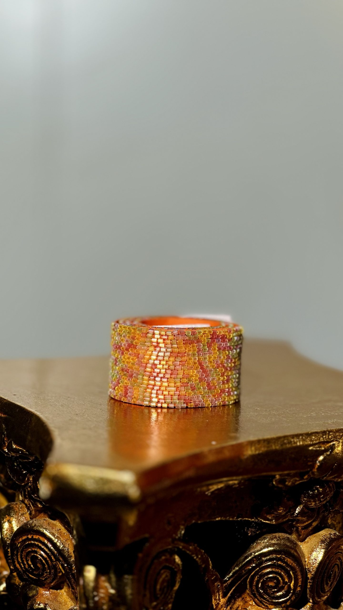 قشاط شك خرز يدوي باللون البرتقالي لموج